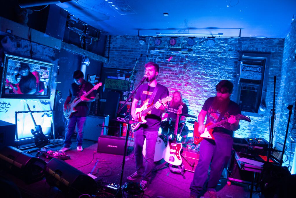 Alternative rock band, Cigarette Trees, performing on stage at Green Lantern Bar